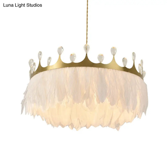Gold Crown Chandelier: Artistic Feather Suspension Light with Crystal Deco