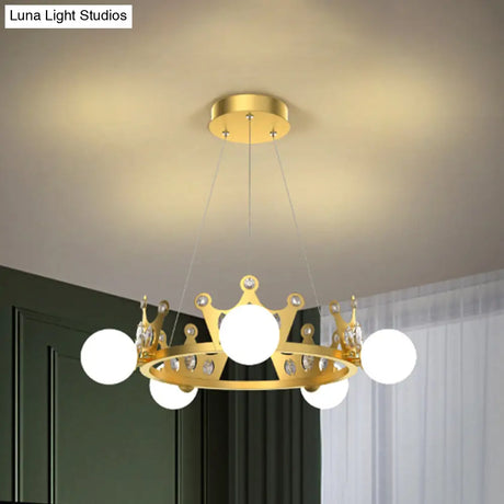 Gold Metal Crown Chandelier Lamp For Kids - 5/8 Lights Hanging Pendant With Frosted Glass Ball Shade