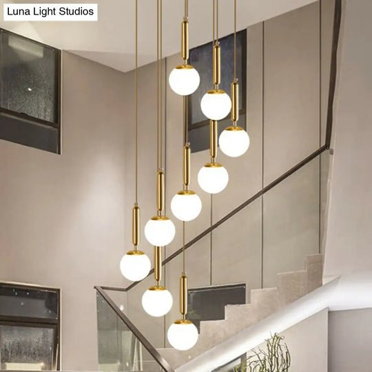Gold Minimalist Stairway Pendant Light With White Glass Ball Multi Hanging