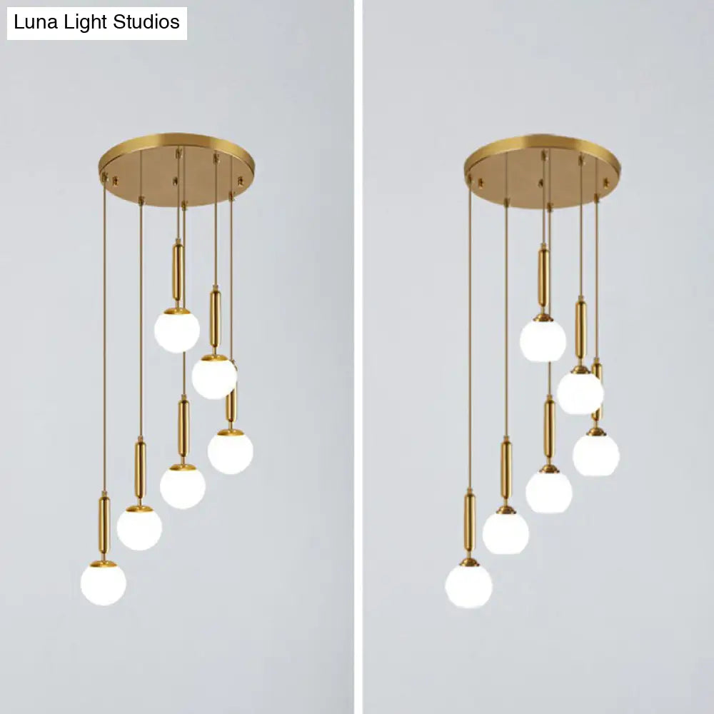Gold Minimalist Stairway Pendant Light With White Glass Ball Multi Hanging