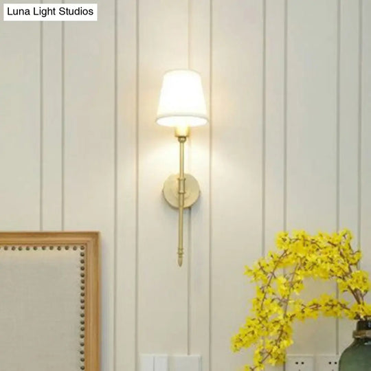 Golden Fabric Wall Sconce With Elongated Arm For Simplistic Bedroom Lighting