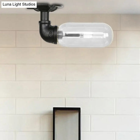 Industrial Black Ceiling Mounted Fixture - Oval Clear Glass Shade Semi Flush Mount With Pipe Design