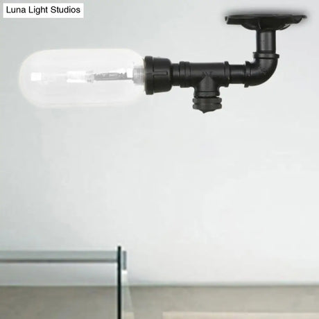 Industrial Black Ceiling Mounted Fixture - Oval Clear Glass Shade Semi Flush Mount With Pipe Design
