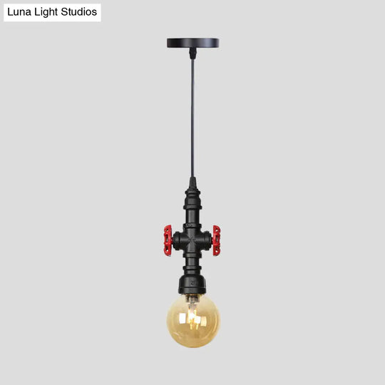 Industrial Black Finish Amber Glass Pendant Lamp With Pipe Suspension - 1-Light Ball/Capsule
