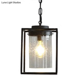 Industrial Black Pendant Light With Seeded Glass Cylinder For Indoor Spaces - Includes Cage