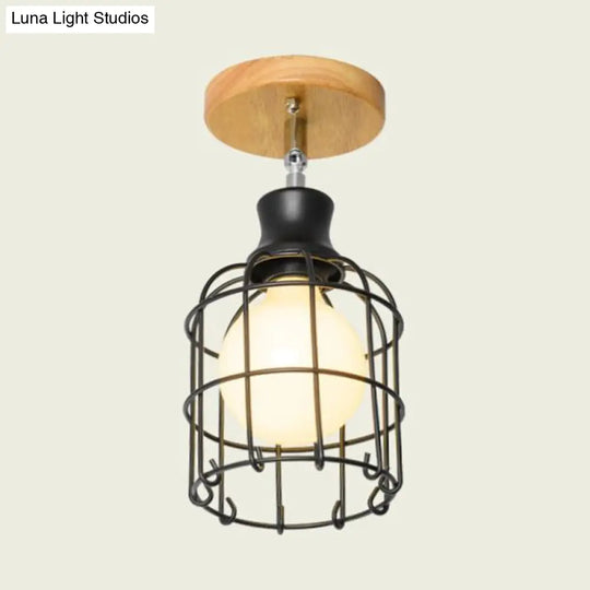 Industrial Loft Ceiling Fixture With Wire Cage And Rotatable Bulb - Black Metallic Semi-Flush Mount