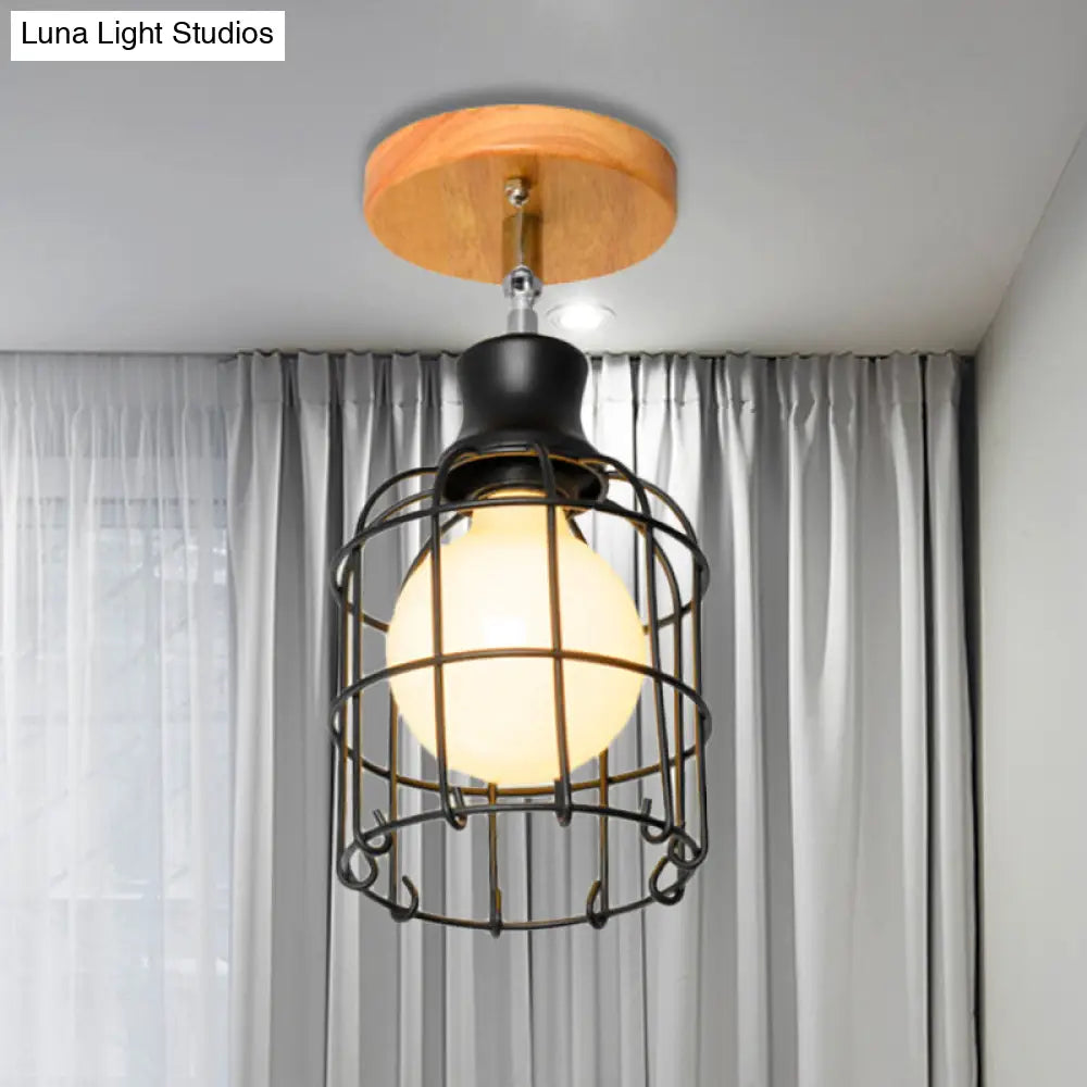 Industrial Loft Ceiling Fixture With Wire Cage And Rotatable Bulb - Black Metallic Semi-Flush Mount