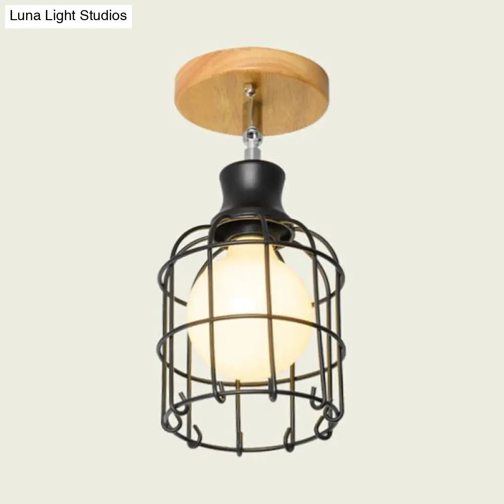 Industrial Loft Ceiling Fixture With Wire Cage And Rotatable Bulb - Black Metallic Semi-Flush Mount