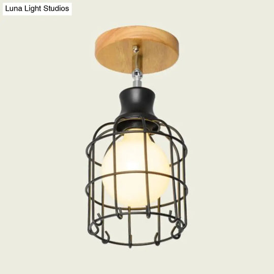 Industrial Loft Ceiling Fixture With Wire Cage And Rotatable Bulb - Black Metallic Semi-Flush Mount