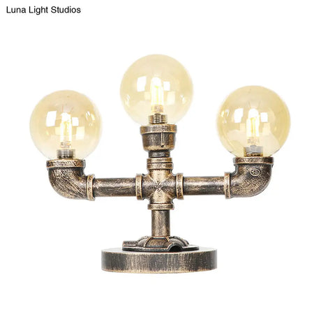 Industrial Task Lighting - Clear/Amber Glass Desk Lamp With Antique Bronze Base