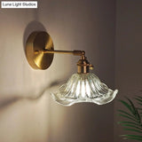 Industrial Wall Mounted Swing Arm Reading Light With Blossom/Bowl Clear Glass Shade - Iron Brass