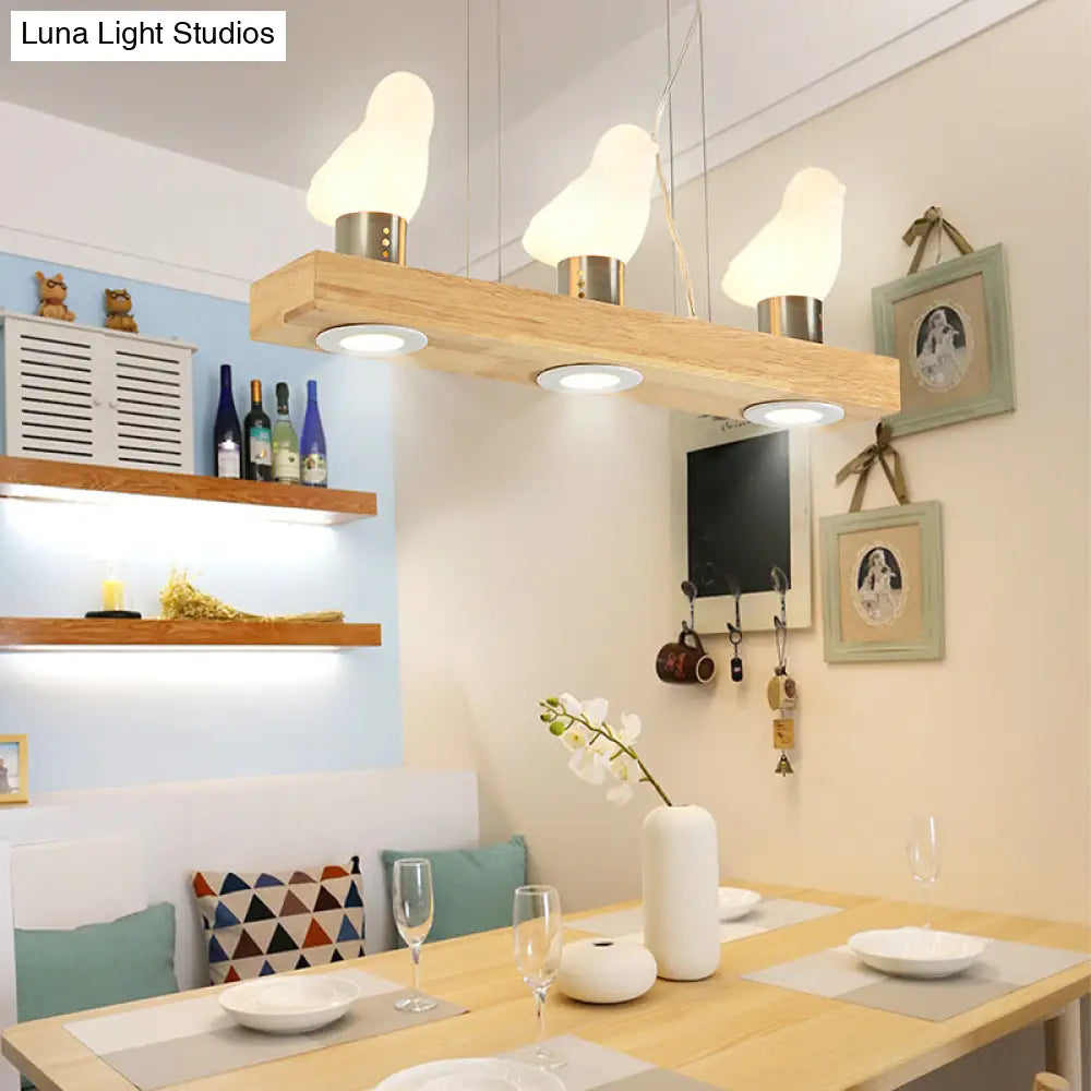 Ivory Glass Bird Island Pendant Lighting Fixture With Decorative Wood Suspended Design