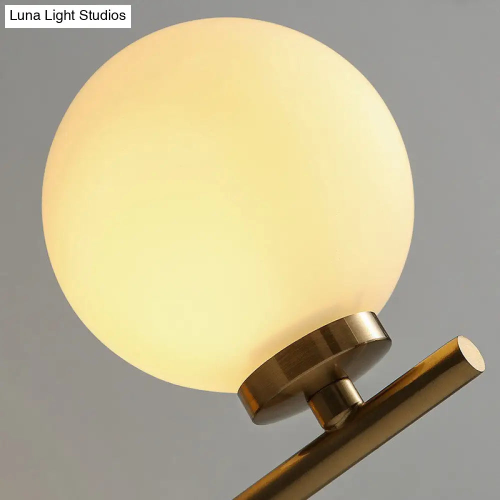 Ivory Glass Single Wall Sconce With Gold Finish For Bedroom - Simple And Elegant