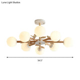 Japanese-Inspired Bedroom Chandelier With Orb Shade Birds Wood And Glass In White