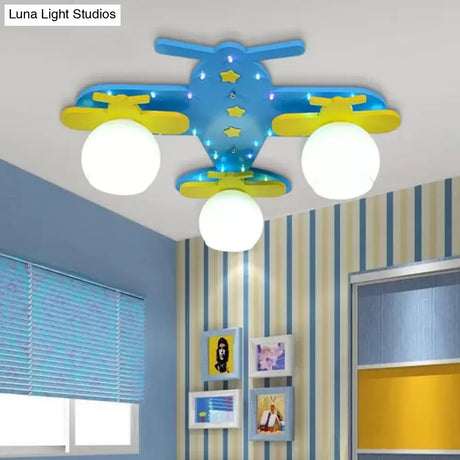 Kindergarten Ceiling Light: Cartoon Wood Flush Mount Propeller Plane Fixture - Blue (3 Bulbs)
