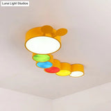 Lighting Up Learning: Yellow Metal Led Flush Mount Fixture With Adorable Cartoon Caterpillar Design