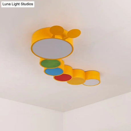 Lighting Up Learning: Yellow Metal Led Flush Mount Fixture With Adorable Cartoon Caterpillar Design