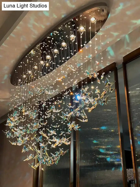 Luxury Crystal Smart LED Chandelier Brushed Steel Finish for Hotels Villas and Highend Establishments chandelier