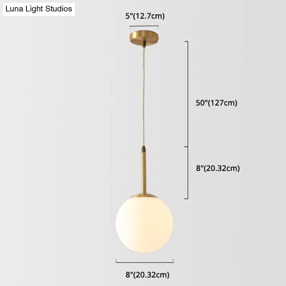 Mid-Century Modern Brass Pendant Light With Spherical White Glass Shade