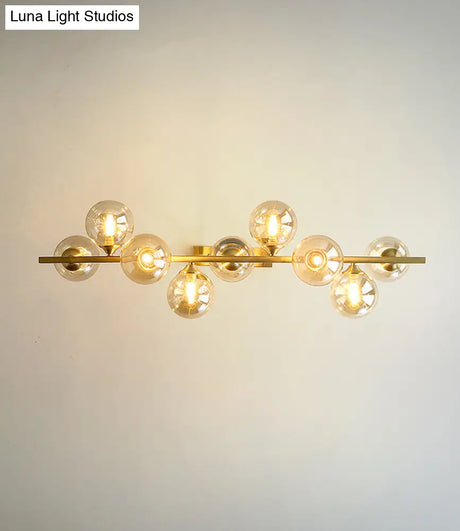 Mid-Century Modern Gold Metal Pendant With Spherical Amber Glass - Island Ceiling Light For Dining
