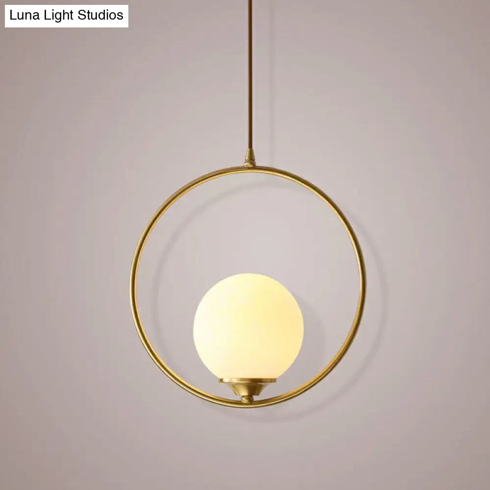 Minimalist Antique Gold Ceiling Lamp With Cream Glass Shade And Ring Decoration