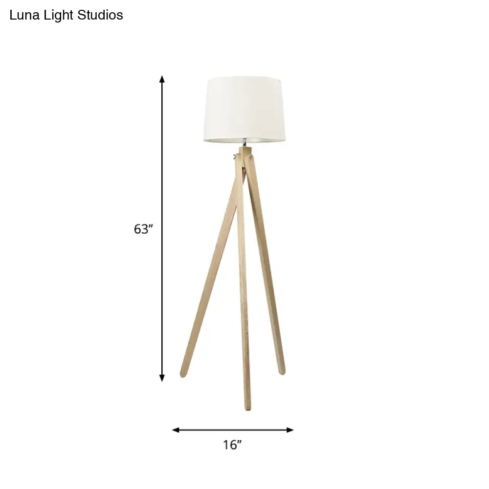 Minimalist Beige Tri-Leg Floor Lamp With Tapered Drum Shade - 1-Light Standing Light Fixture