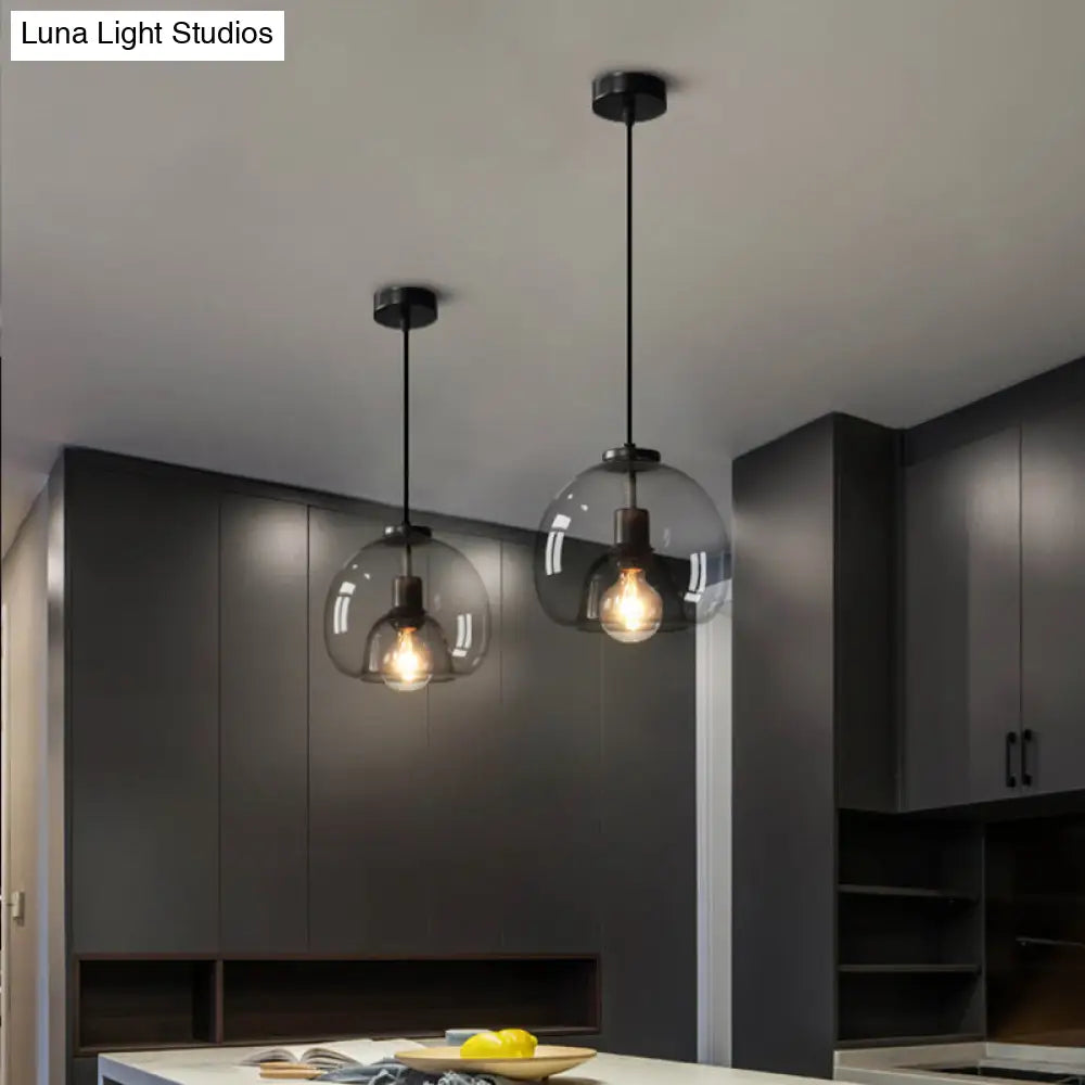 Minimalist Black Glass Pendant Light For Modern Dining Rooms