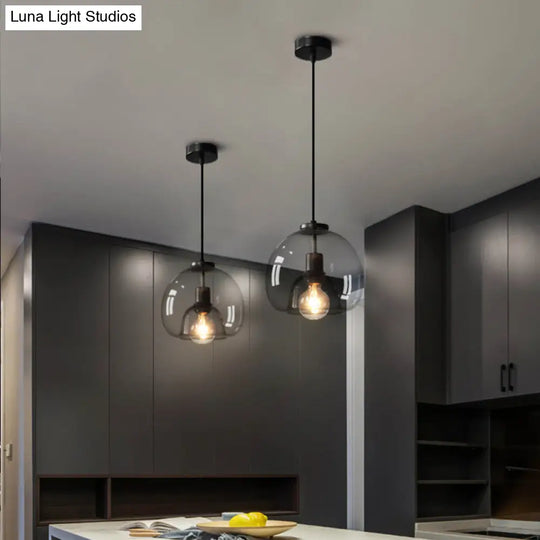 Minimalist Black Glass Pendant Light For Modern Dining Rooms