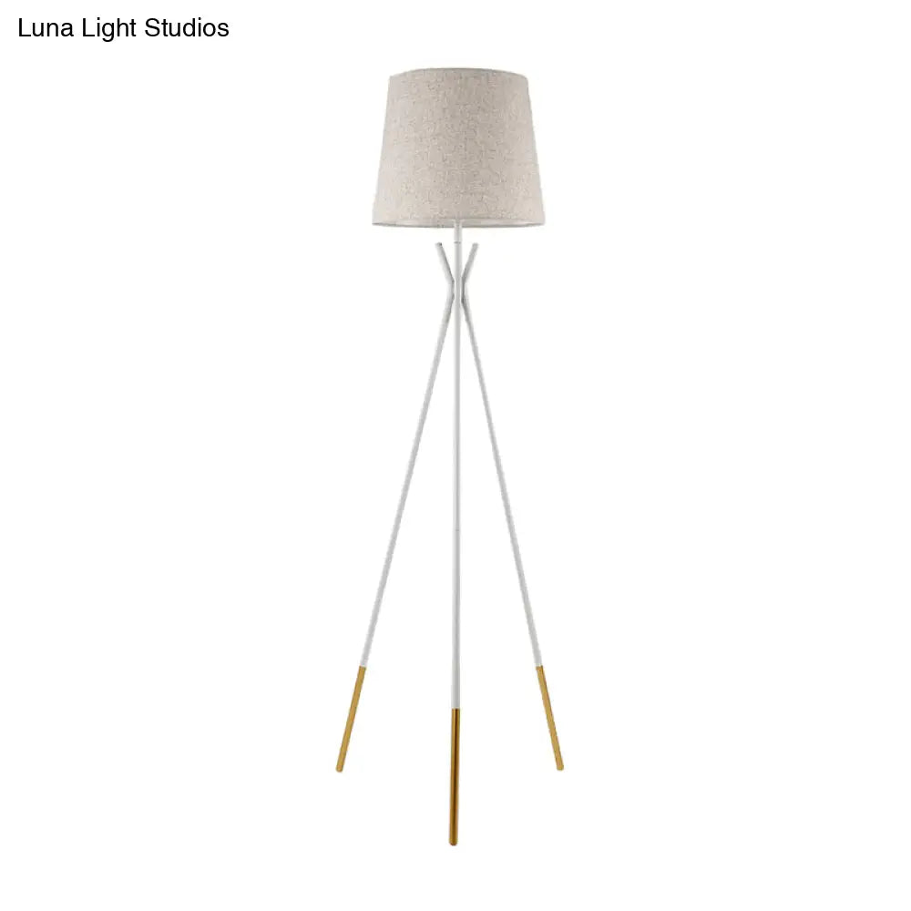 Minimalist Black/White Tapered Floor Lamp With Brass Accents