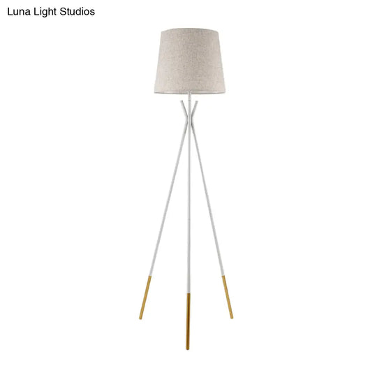 Minimalist Black/White Tapered Floor Lamp With Brass Accents