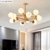 Sleek Minimalist Cream Glass Bedroom Chandelier Light With Wood-Embellished Modo Shaped
