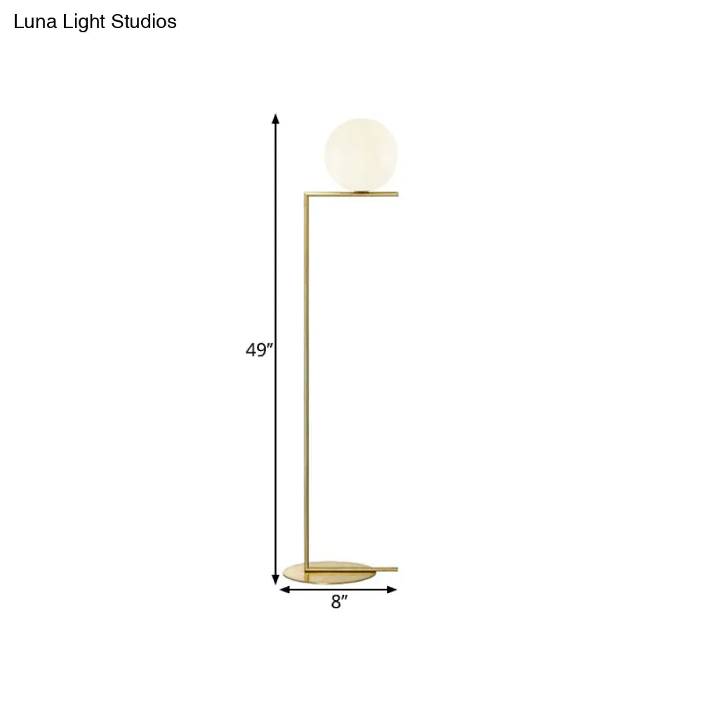 Minimalist Gold Orb Floor Lamp With Frosted Glass Shade And Right Angle Stand