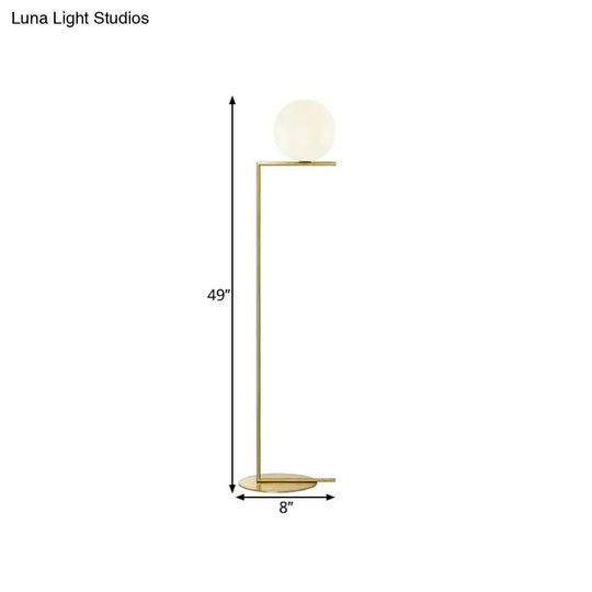 Minimalist Gold Orb Floor Lamp With Frosted Glass Shade And Right Angle Stand