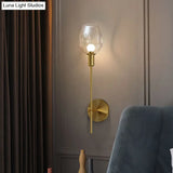 Minimalist Gold Sconce Wall Light With Clear Dimpled Cup And Pencil Arm For Hallway