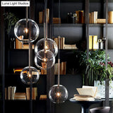 Minimalist Hand-Blown Glass Globe Hanging Lamp - Gold Finish Pendant Light