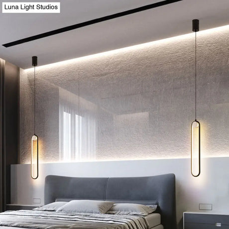 Minimalist Led Oval Metallic Pendulum Pendant Ceiling Light In Black With Natural Lighting