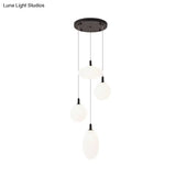 Minimalistic Gold/Black Pendant Lamp With 4 Lights And Cream Glass’ Or ’Minimalist 4-Light Glass