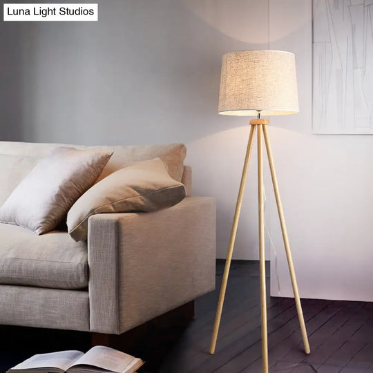 Minimalistic Tripod Floor Lamp With White Drum Shade - 1 Light Fabric