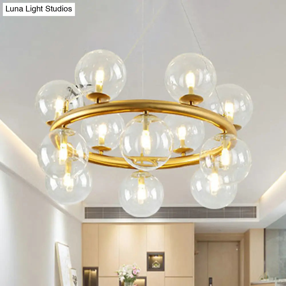 Modern 12-Bulb Gold Chandelier With Clear Glass Shade - Stylish Globe Suspension Light