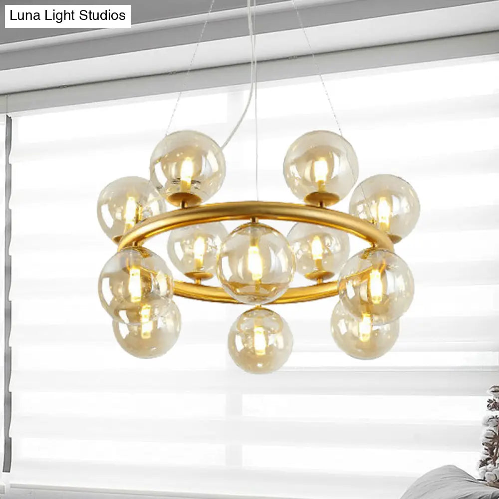 Modern 12-Bulb Gold Chandelier With Clear Glass Shade - Stylish Globe Suspension Light
