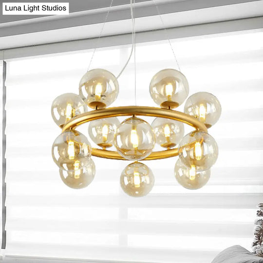 Modern 12-Bulb Gold Chandelier With Clear Glass Shade - Stylish Globe Suspension Light