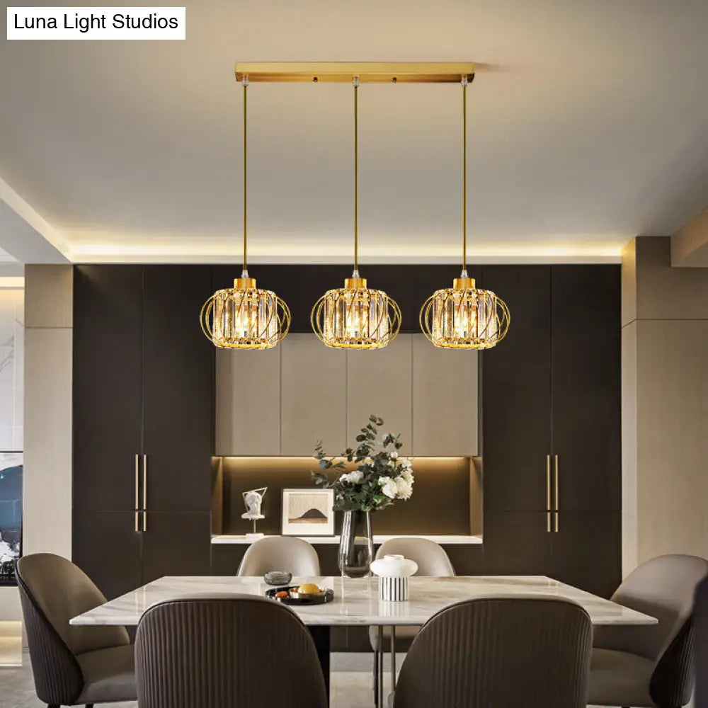 Modern Brass Globe Pendant Light With Crystal Accents Stylish Ceiling Lantern For Dining Area