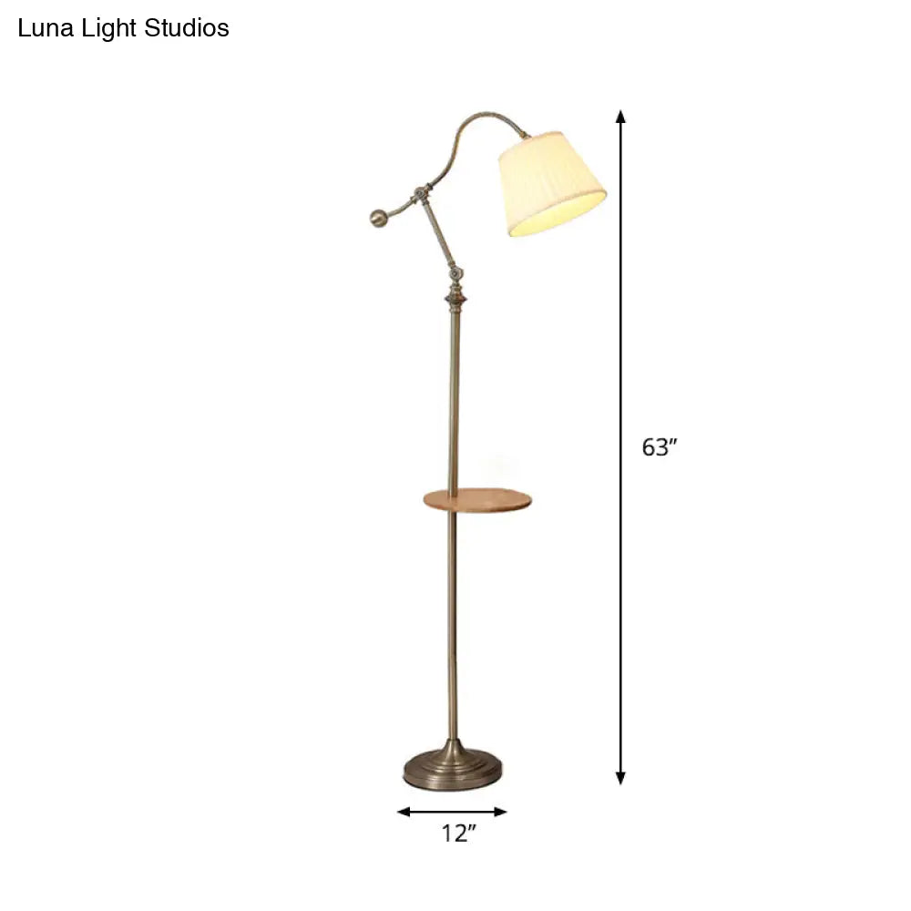 Modern Bronze Swing Arm Floor Lamp With Metallic Barrel Shade