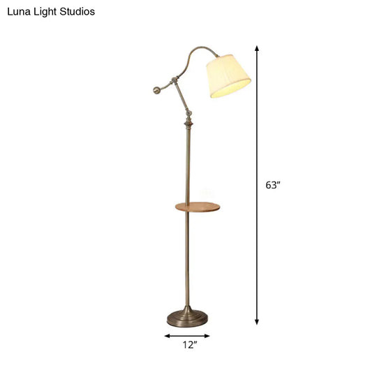 Modern Bronze Swing Arm Floor Lamp With Metallic Barrel Shade