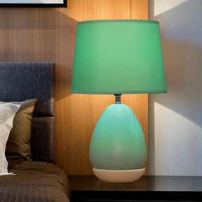 Modern Ceramic Egg-Shaped Bedside Night Light With Blue Drum Fabric Shade