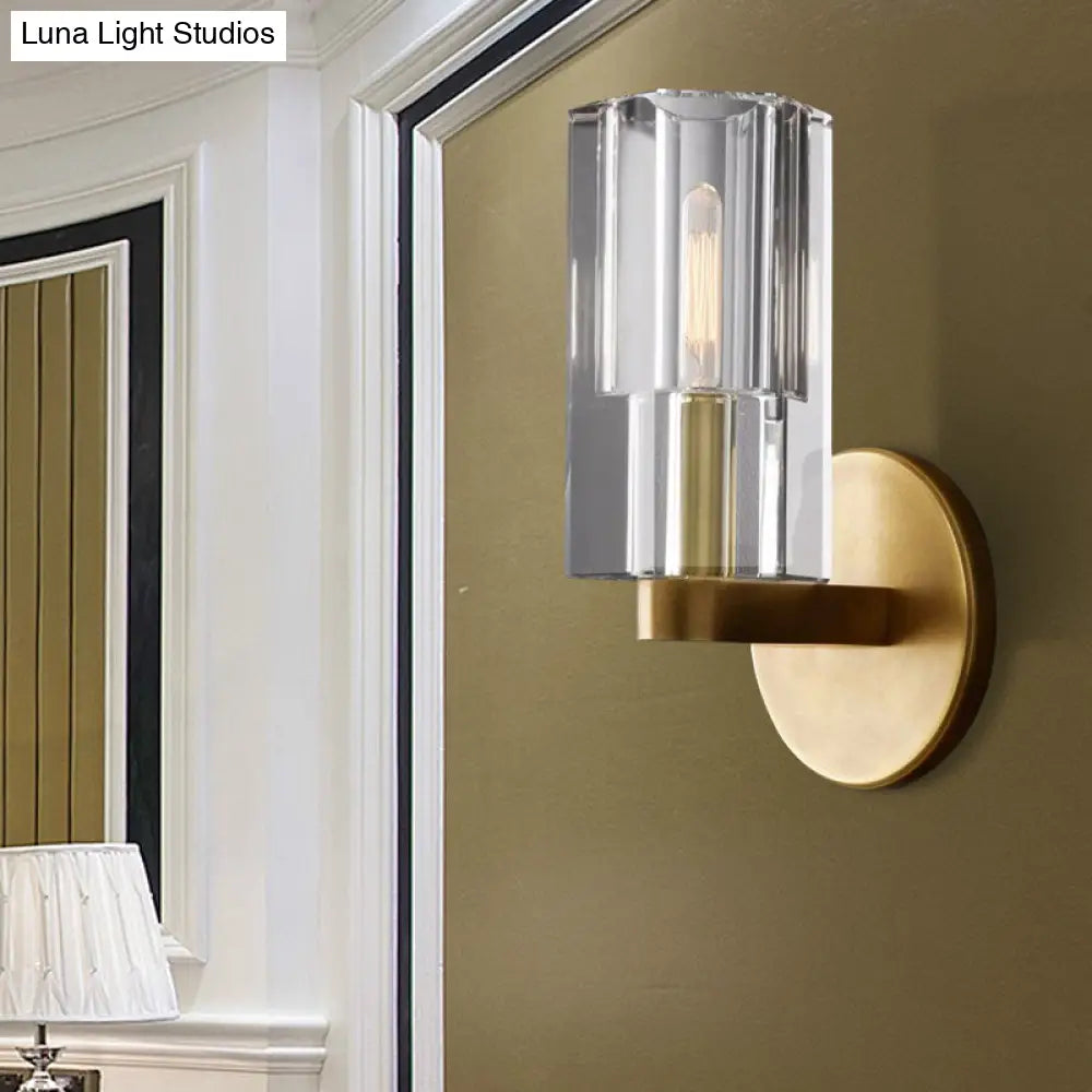Modern Clear Crystal Cylinder Wall Lamp With Brass Backplate - 1 Light Fixture