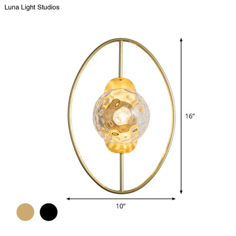 Modern Clear Glass Orb Sconce Lamp - 1-Bulb Black/Gold Wall Light With Ring Detail