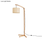 Modern Cylinder Fabric Reading Floor Lamp With Wood Base And Bow Pole