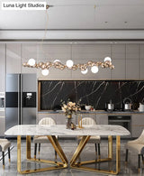 Modern Gold Metal Pendant Lighting With Glass Spherical Shade - Ideal For Dining Table Or Island