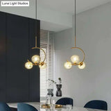Modern Metal Hanging Chandelier In Gold With Globe Glass Shade - Bedroom Ceiling Light